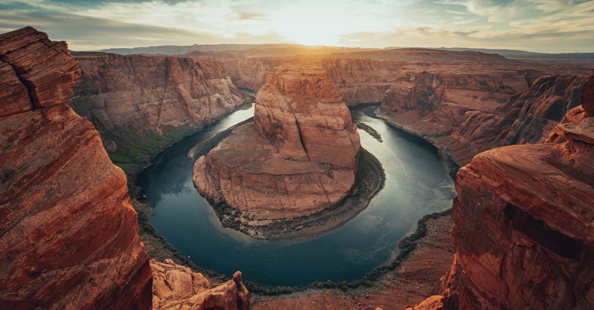 A breathtaking aerial view of Horseshoe Bend during sunset, capturing its majestic curves and vivid colors.